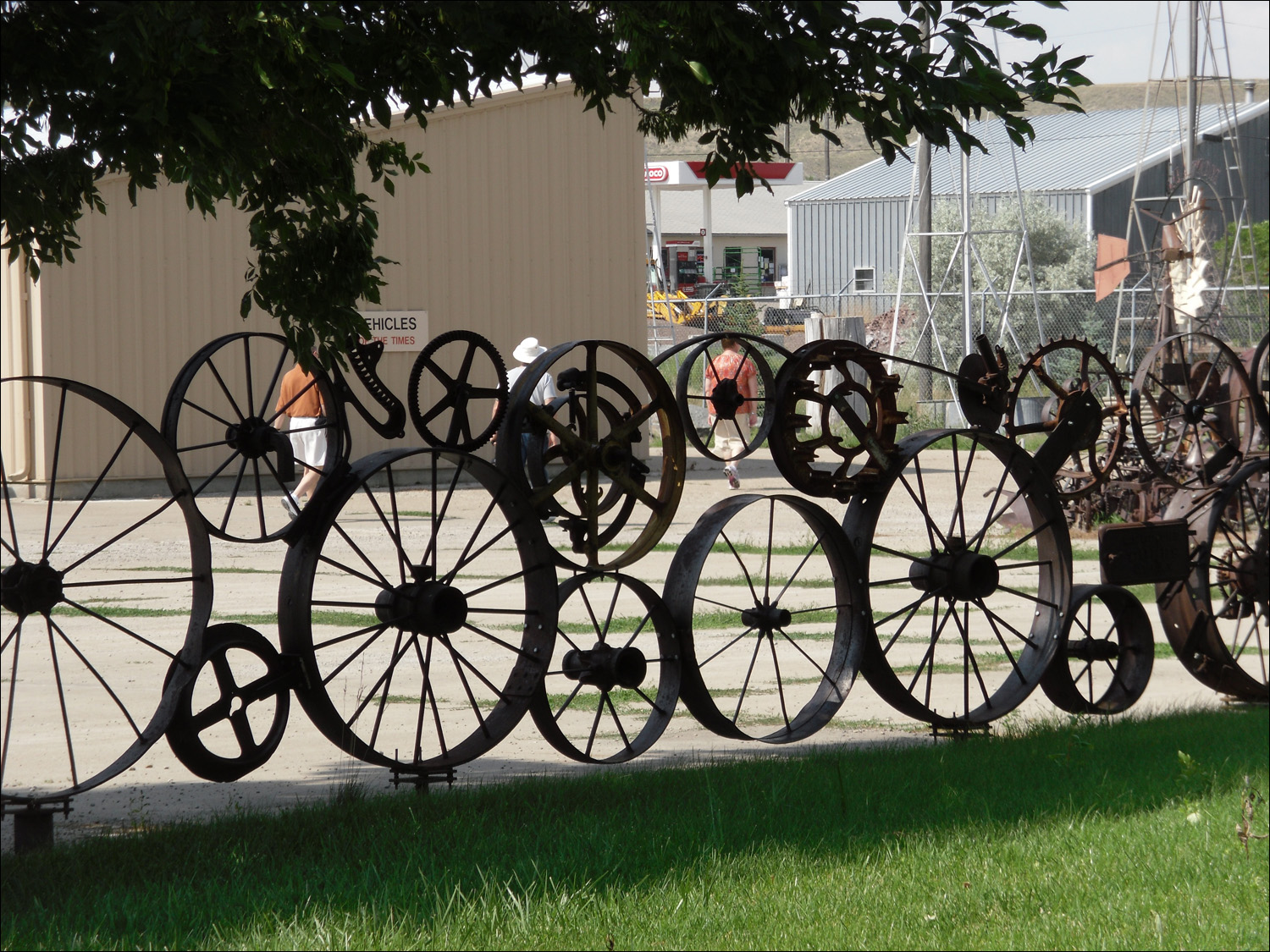 Fort Benton, MT Agriculture Museum-old iron wheel fence